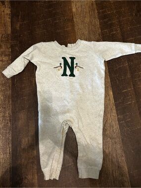 Cream Baby One-Piece Romper with Green 'N' Emblem